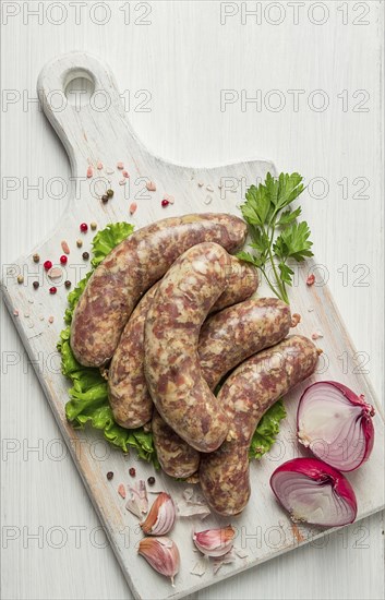 Raw kupaty, traditional Georgian sausages, raw sausages, with spices and herbs, Georgian cuisine