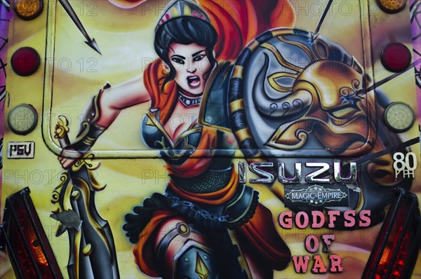 Painting on a bus (Nairobi, Kenya) . Bus locally called matatu
