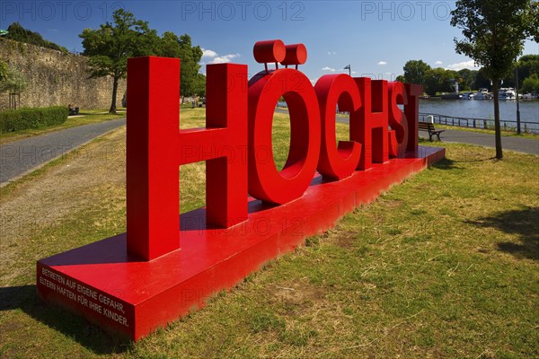 Red Höchst lettering on the banks of the Main, Frankfurt-Höchst, Frankfurt am Main, Hesse, Germany,