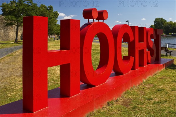Red Höchst lettering on the banks of the Main, Frankfurt-Höchst, Frankfurt am Main, Hesse, Germany,