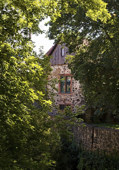 View through trees to the Schlosscafè, Höchster Schloss or Altes Schloss Höchst, Frankfurt-Höchst,