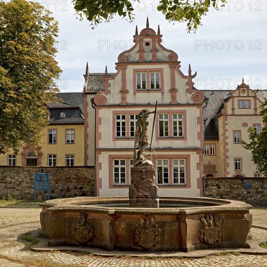 St George's Fountain in front of the castle in the grounds of Friedberg Castle, Friedberg, Hesse,