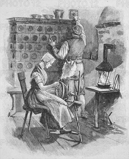 Light through a pinewood lamp in a farmhouse in the spinning room around 1800, Historical,