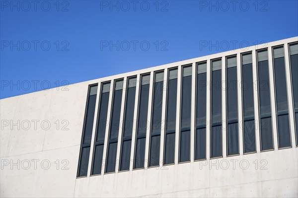White façade with windows against a blue sky, NS Documentation Centre in the Kunstareal Munich,