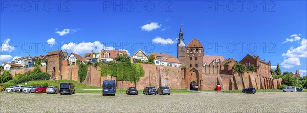 Town wall at the harbour with Elbe gate and tower of the Protestant church St. Stephan, panoramic