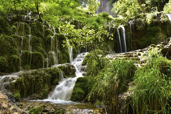Waterfall at the Brühlbach stream in Bad Urach in the Swabian Alb, Baden-Württemberg, Germany,