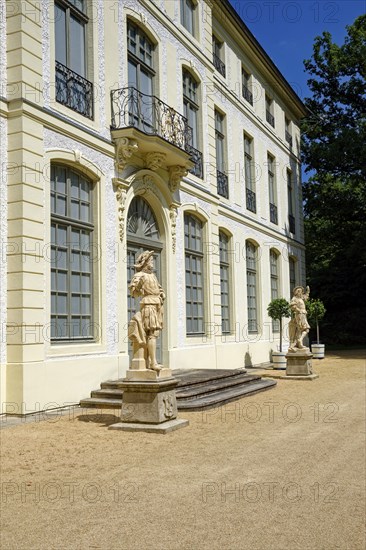 Main portal with two hunter figures, summer palace and park, residential town of Greiz, Thuringia,