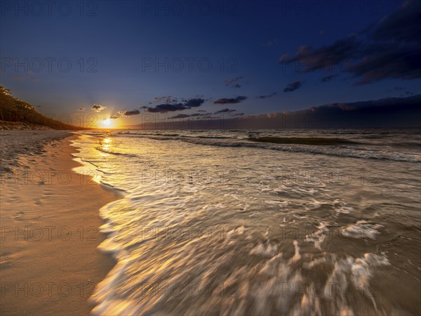 Sunset on a sandy beach on the island of Usedom on the Baltic Sea, Zempin, Mecklenburg-Western