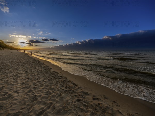 Sunset on a sandy beach on the island of Usedom on the Baltic Sea, Zempin, Mecklenburg-Western