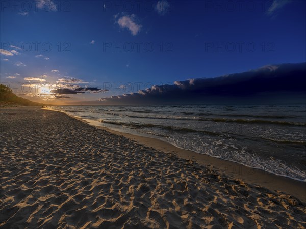 Sunset on a sandy beach on the island of Usedom on the Baltic Sea, Zempin, Mecklenburg-Western