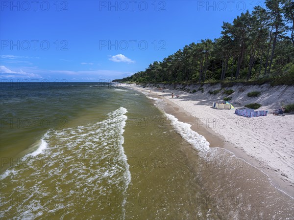 Sandy beach beach with clouds in the blue sky on the island of Usedom on the Baltic Sea, Zempin,