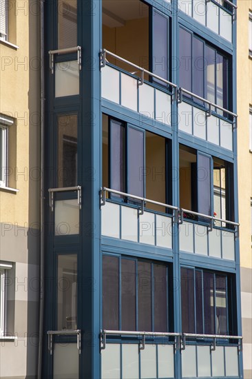 Living space extension through balcony glazing with sliding system