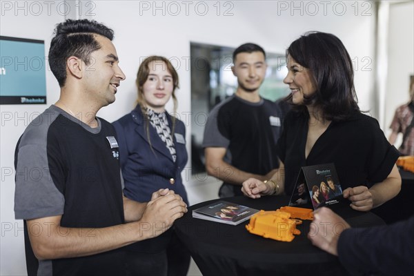 Annalena Bärbock (Alliance 90/The Greens), Federal Foreign Minister, pictured with young employees,