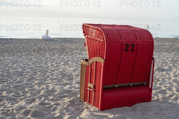 Red beach chair on the Baltic Sea, Dierhagen, Mecklenburg-Vorpommern, Germany, Europe