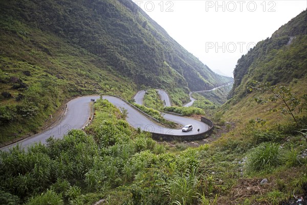 Winding road through the northern mountain landscape, Ha Giang province, Vietnam, Asia