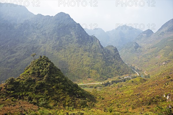 Road through the northern mountain landscape, Ha Giang province, Vietnam, Asia