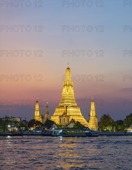 Wat Arun Temple lit up at night, Bangkok, Thailand, Asia