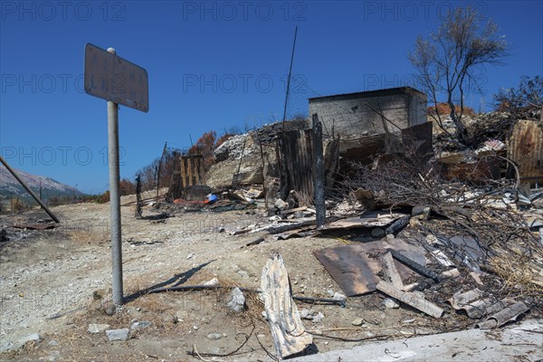 Burnt land, trees, bushes, fire, forest fire 2023 Mountain village of Laerma, Rhodes, Dodecanese,