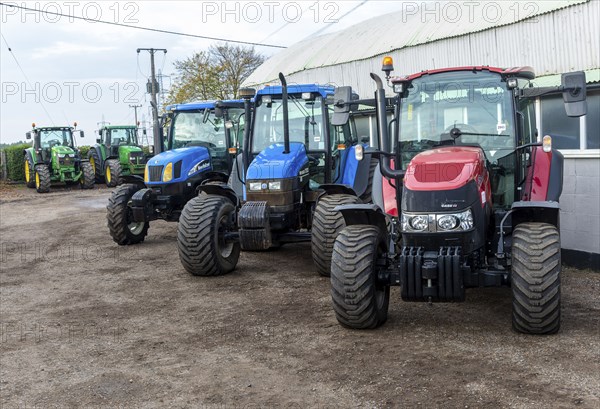 Row of tractors in farm machinery auction sale, Campsea Ashe, Suffolk, England, UK