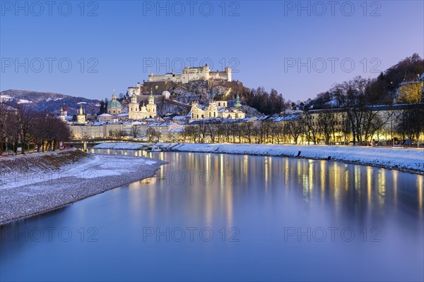 Salzburg in winter at the blue hour, Old Town, Cathedral, Fortress Hohen Salzburg, Salzach,