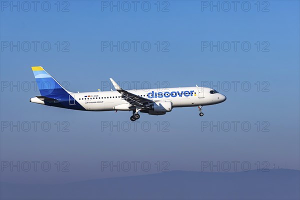 Discover Airlines aircraft with new design on approach, Frankfurt Airport, Fraport Airport.
