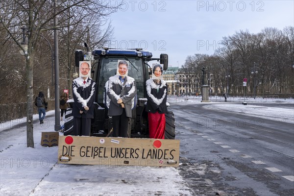 Farmers' protest action, tractor with protest display, StraÃŸe des 17. Juni, Berlin, Germany,