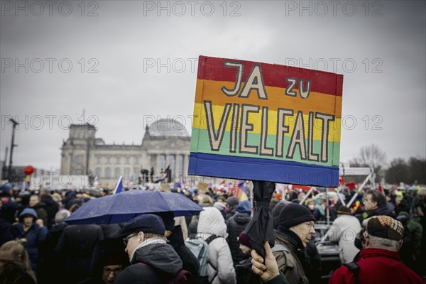 Posters at the large demonstration against the right in Berlin under the slogan We are the firewall
