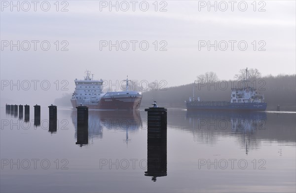 LNG tanker Ramanda sailing in fog in the Kiel Canal, Kiel Canal, Schleswig-Holstein, Germany,