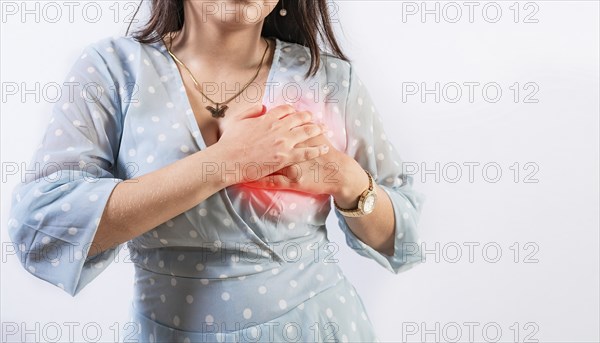 Unrecognizable woman with chest pain isolated. Girl with heart pain on isolated background. Concept
