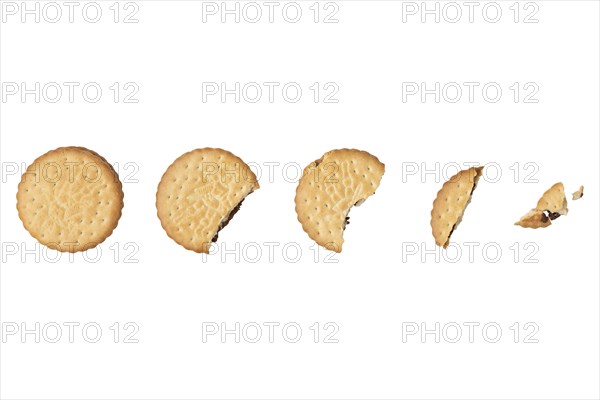 Double biscuit getting smaller by biting off, food photography, white background