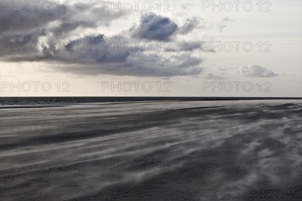 Mudflat landscape with dune sand, drifts in stormy weather, Norderney Island, North Sea, East