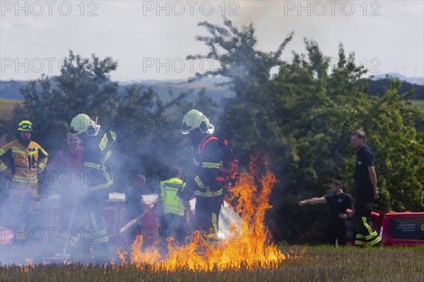 During controlled field fires, the firefighters were able to test various extinguishing methods,