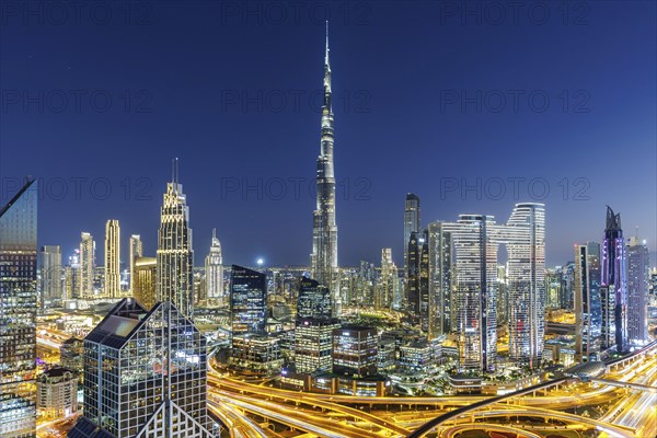 Burj Khalifa skyline tallest building in the world from above in Downtown at night in Dubai, United