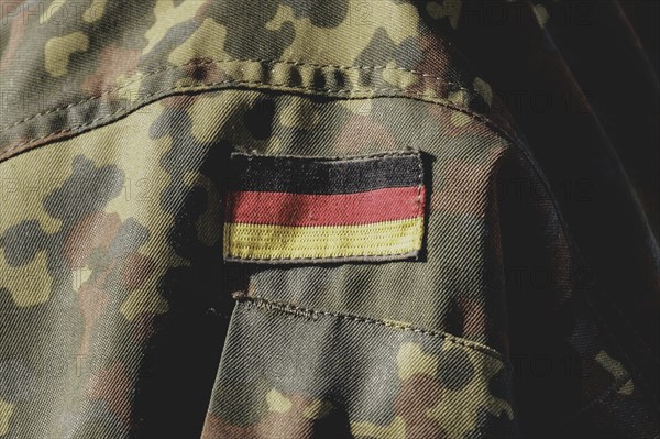 German flag on the clothing of a soldier, taken during the military exercise 'Wettiner Schwert'