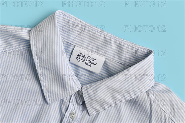 Clothing label with text saying 'Child labour free'