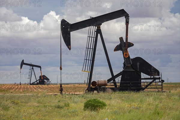 Plains, Texas, Oil wells on farm land in the Permian Basin