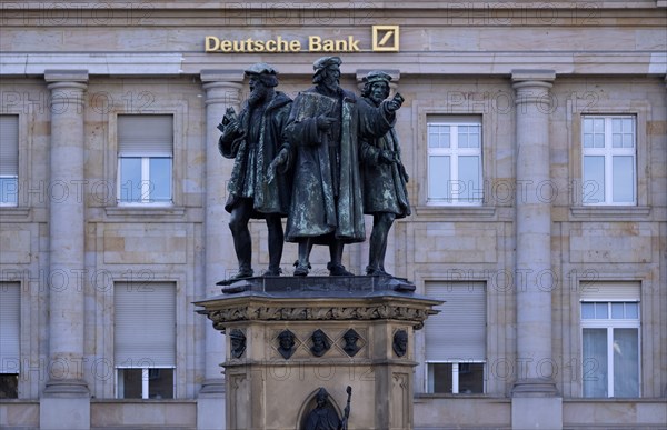 Statue, fountain, monument to Johannes Gutenberg, RoÃŸmarkt, behind it Deutsche Bank, lettering,
