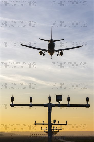 Aeroplane approaching, runway lighting, evening mood, Stuttgart-Echterdingen Airport,