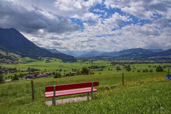 Resting bench on the Gebhardshöhe above the municipality of Rettenberg in AllgÃ¤u, Bavaria,