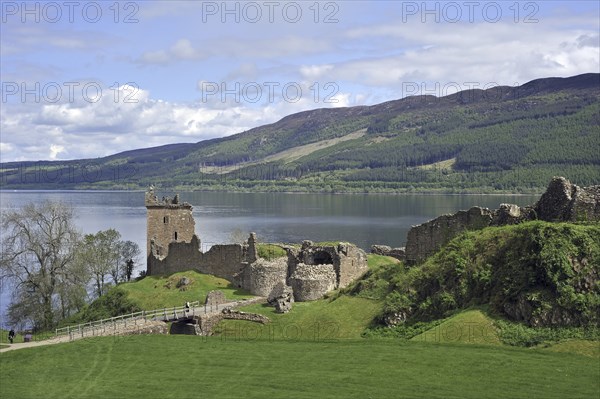 The ruins of Urquhart Castle beside Loch Ness near Drumnadrochit, Scotland, UK