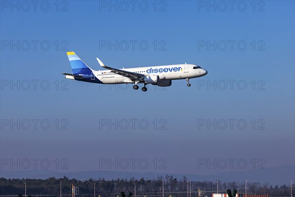 Discover Airlines aircraft with new design on approach, Frankfurt Airport, Fraport Airport.
