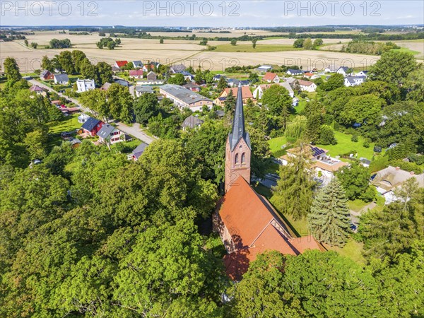 Aerial view, drone photo of Krummin village church and village, Krumminer Wiek on the Peenestrom,