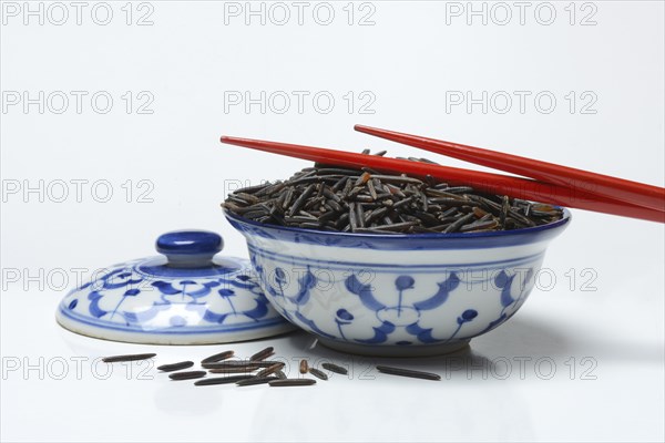 Rice, black wild rice in bowl with chopsticks, Canada, North America