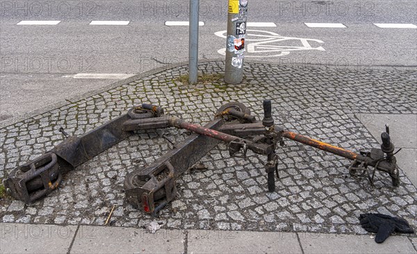 Rusty electric scooters on public streets, East Side Galery in Berlin-Mitte, Berlin, Germany,