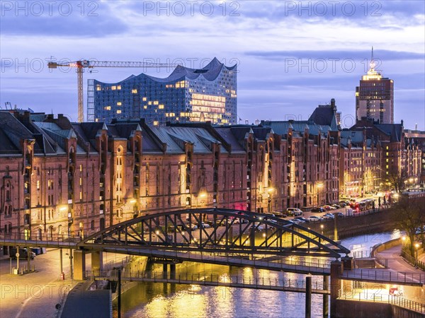 Aerial view of Speicherstadt Hamburg and the Elbe Philharmonic Hall with customs canal at blue