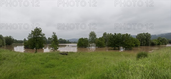 Symbolic image extreme weather, global warming, climate change, flood retention basin, flood