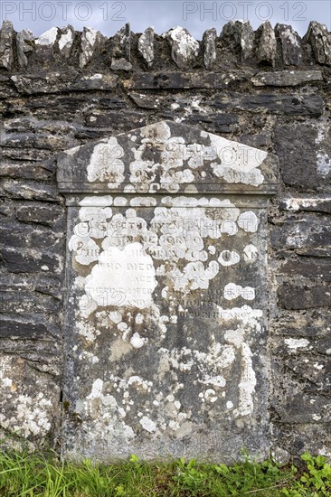 Old, weathered gravestone on the cemetery wall in Kilmartin, Argyll and Bute, Scotland, Great