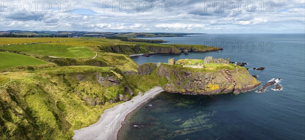Aerial panorama of Dunnottar Castle ruins on the North Sea coast, Stonehaven, Aberdeenshire,