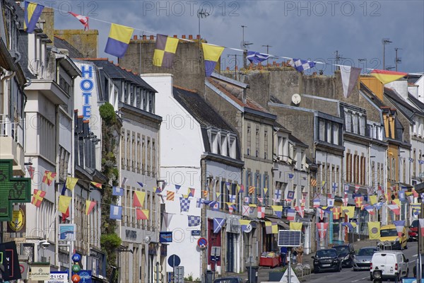 Residences and shops on the Avenue de la Gare in the centre of Concarneau. Brittany, Finistere,