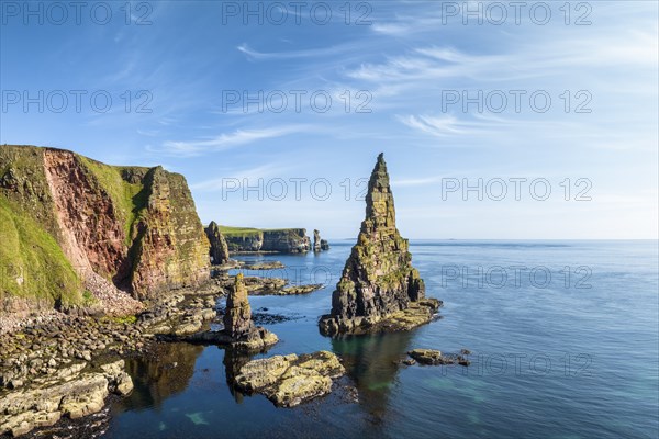 Aerial view of the rugged coastal landscape with the Duncansby Stacks, Duncansby Head coast, County